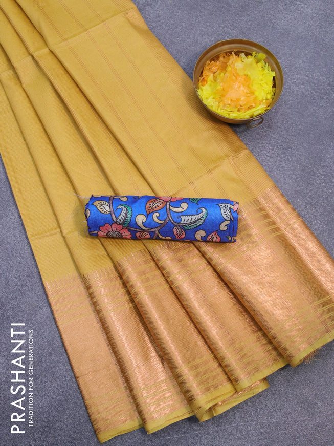 Semi tussar saree lime yellow and royal blue with plain body and copper zari woven border & kalamkari printed blouse