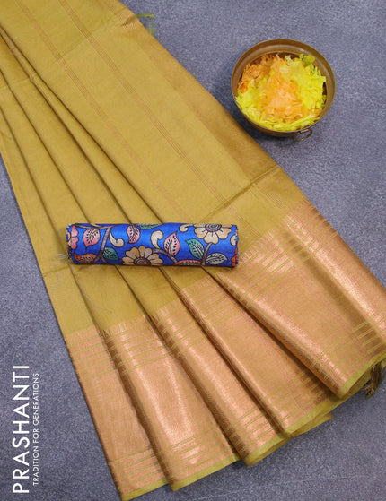 Semi tussar saree lime yellow and royal blue with plain body and copper zari woven border & kalamkari printed blouse