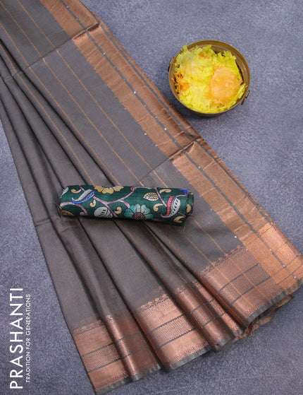 Semi tussar saree grey shade and dark green with plain body and copper zari woven border & kalamkari printed blouse