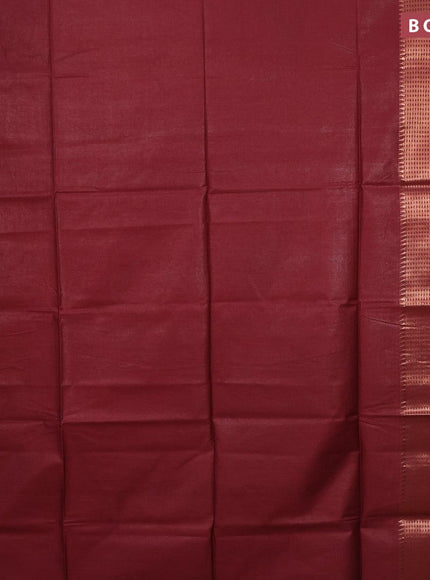 Semi tussar saree maroon and dark green with plain body and long copper zari woven border & kalamkari printed blouse