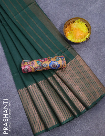 Semi tussar saree dark green and mustard yellow with plain body and long copper zari woven border & kalamkari printed blouse