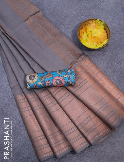 Semi tussar saree grey and teal blue with plain body and long zari woven border & kalamkari printed blouse