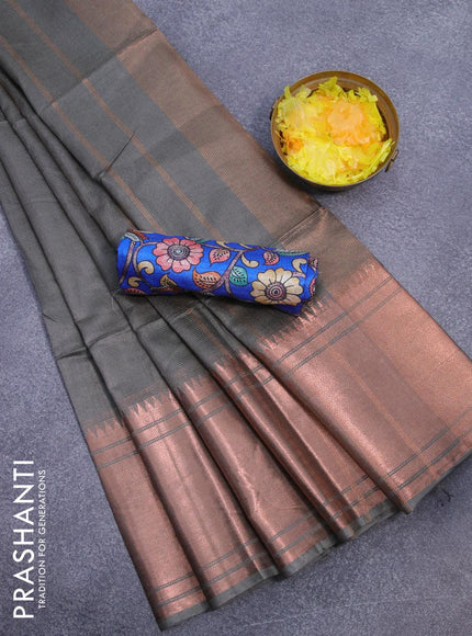 Semi tussar saree grey and blue with plain body and long copper zari woven border & kalamkari printed blouse