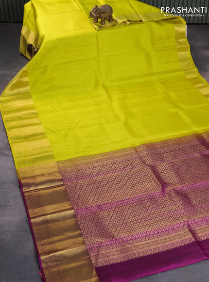 Pure kanjivaram silk saree lime yellow and purple with allover zari weaves and zari woven border