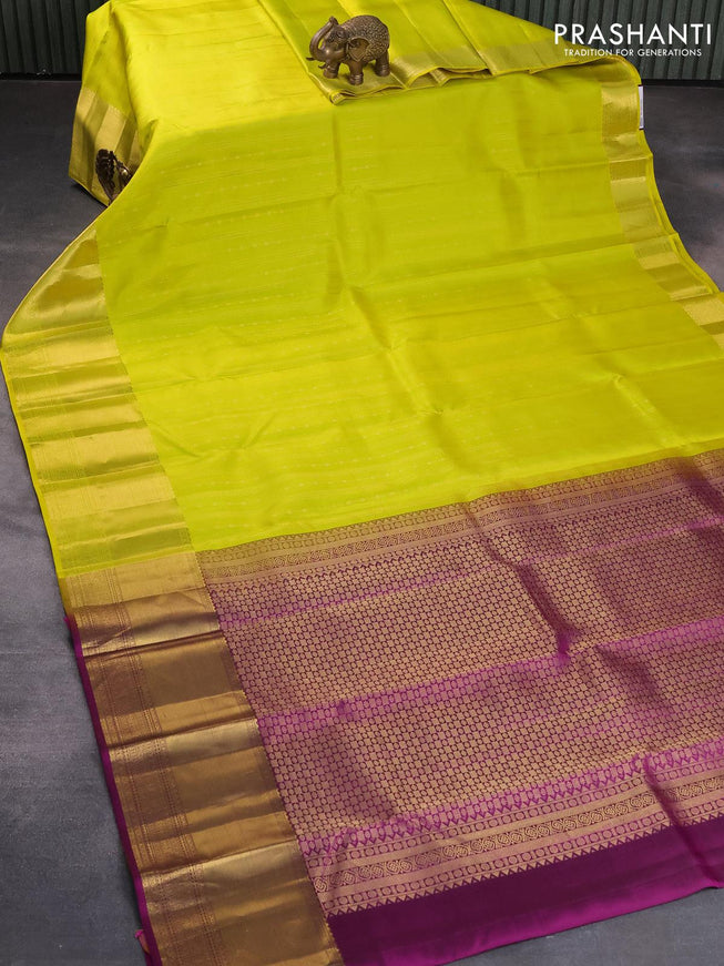 Pure kanjivaram silk saree lime yellow and purple with allover zari weaves and zari woven border