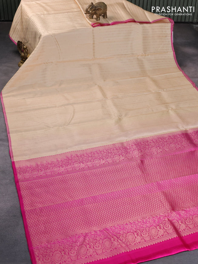 Pure kanjivaram silk saree sandal and pink with allover zari weaves and piping border