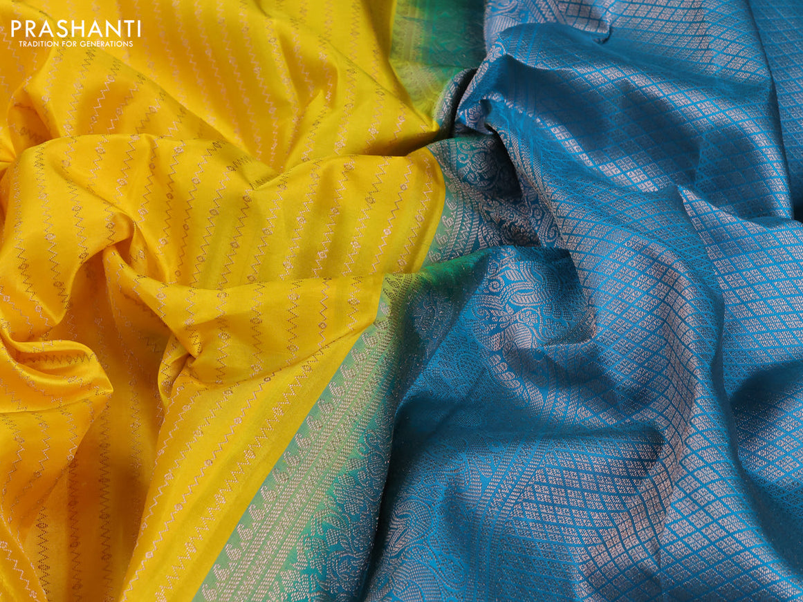 Pure kanjivaram silk saree mango yellow and teal green with allover zari weaves and piping border