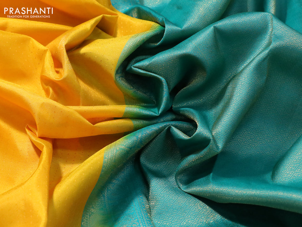 Pure kanjivaram silk saree yellow and teal green with allover self emboss & buttas and zari woven border