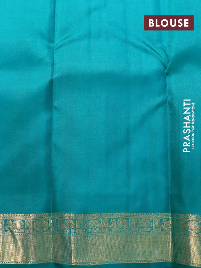 Pure kanjivaram silk saree yellow and teal green with allover self emboss & buttas and zari woven border