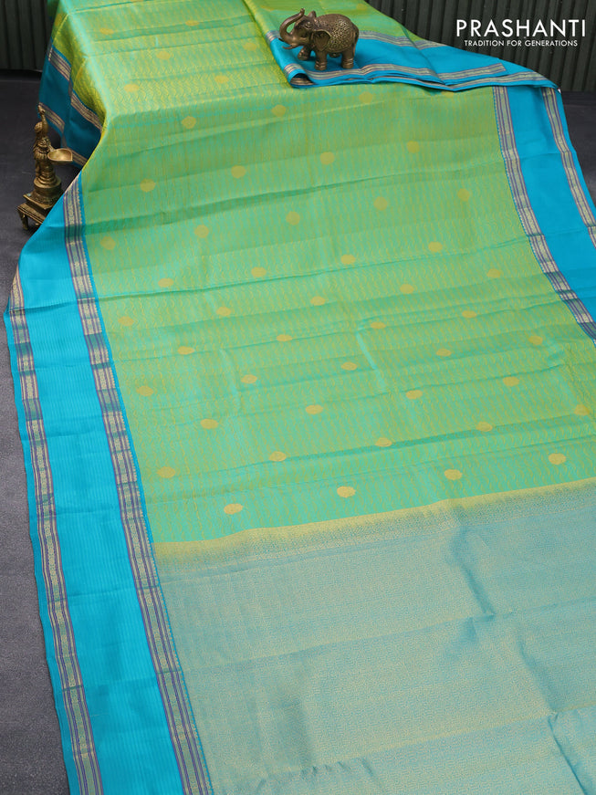 Pure kanjivaram silk saree yellowish green and teal blue with allover self emboss & buttas and rettapet zari woven border