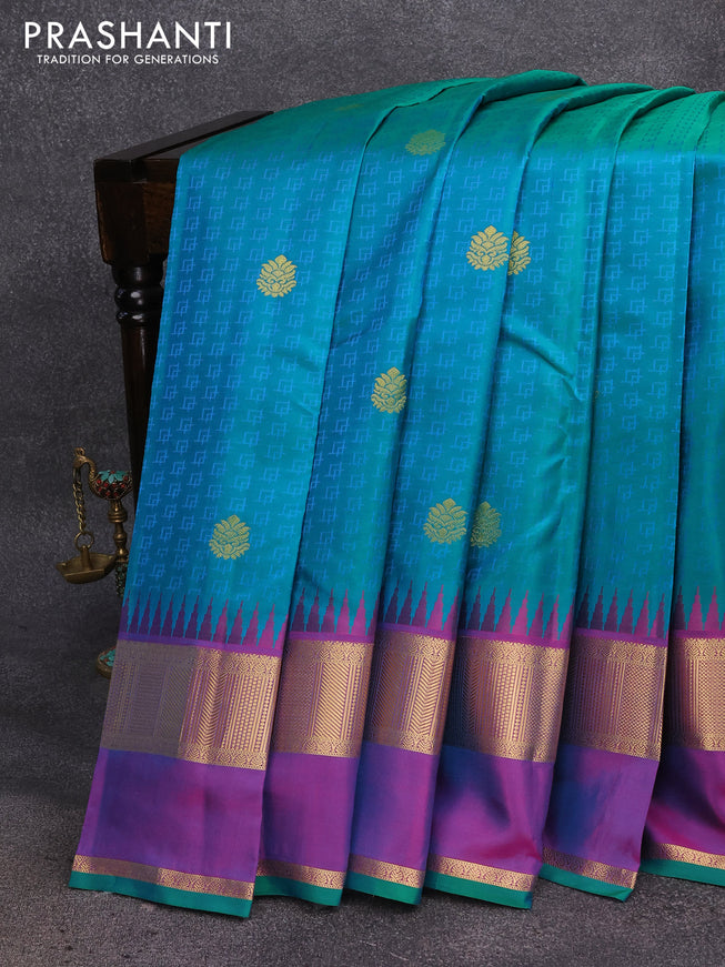 Pure kanjivaram silk saree dual shade of teal green and dual shade of purple with allover self emboss & buttas and temple design rettapet zari woven border