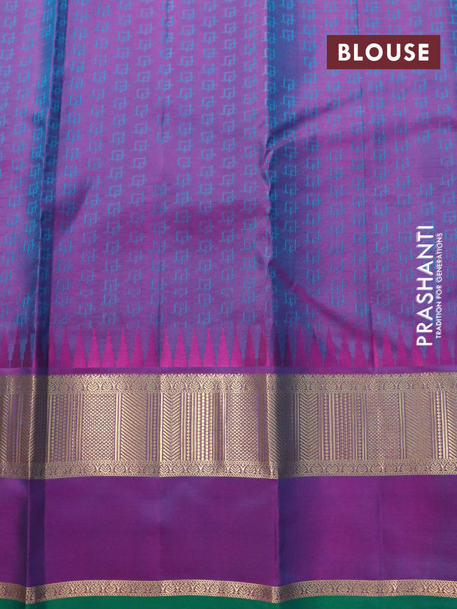 Pure kanjivaram silk saree dual shade of teal green and dual shade of purple with allover self emboss & buttas and temple design rettapet zari woven border