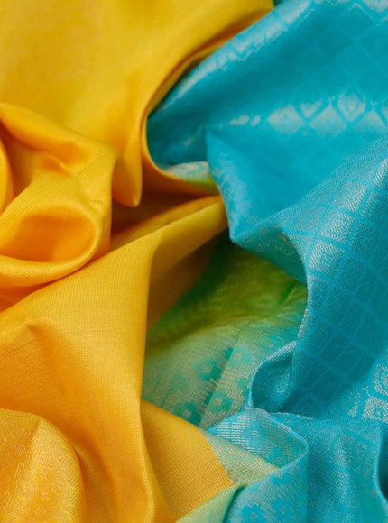 Pure kanjivaram silk saree yellow and teal blue with zari woven buttas in borderless style