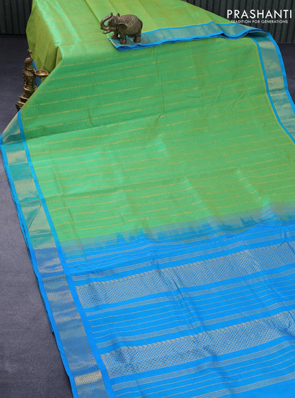 10 yards silk cotton saree light green and cs blue with allover zari weaves and zari woven border