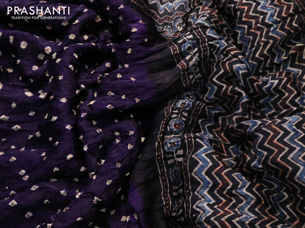 Modal silk saree deep violet and black with allover bandhani prints and ajrakh printed pallu