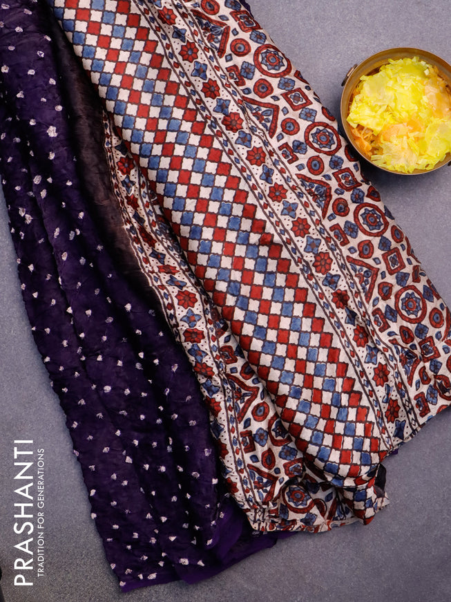 Modal silk saree deep violet and cream with allover bandhani prints and ajrakh printed pallu