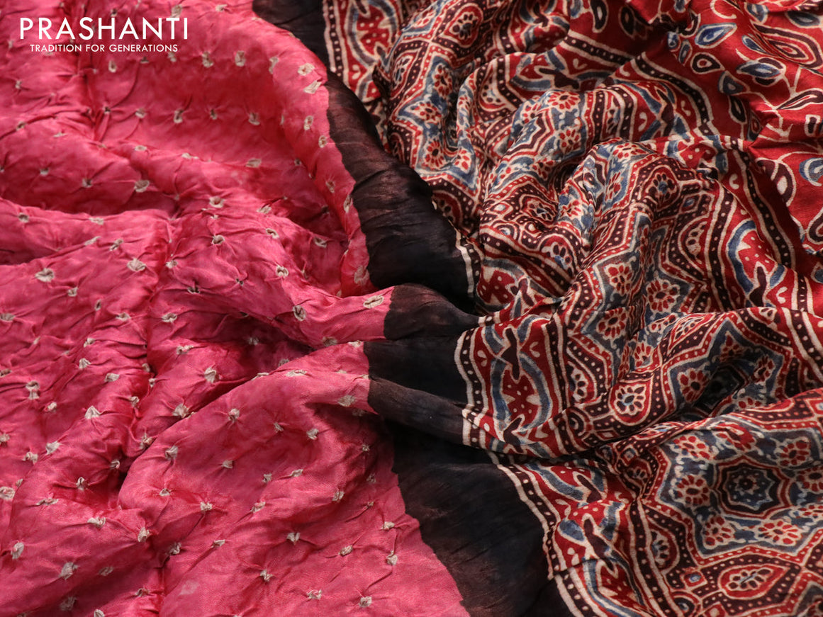 Modal silk saree pink shade and maroon with allover bandhani prints and ajrakh printed pallu