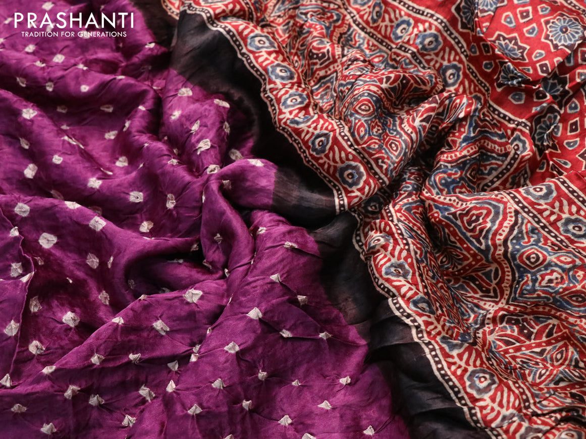 Modal silk saree purple shade and maroon with allover bandhani prints and ajrakh printed pallu