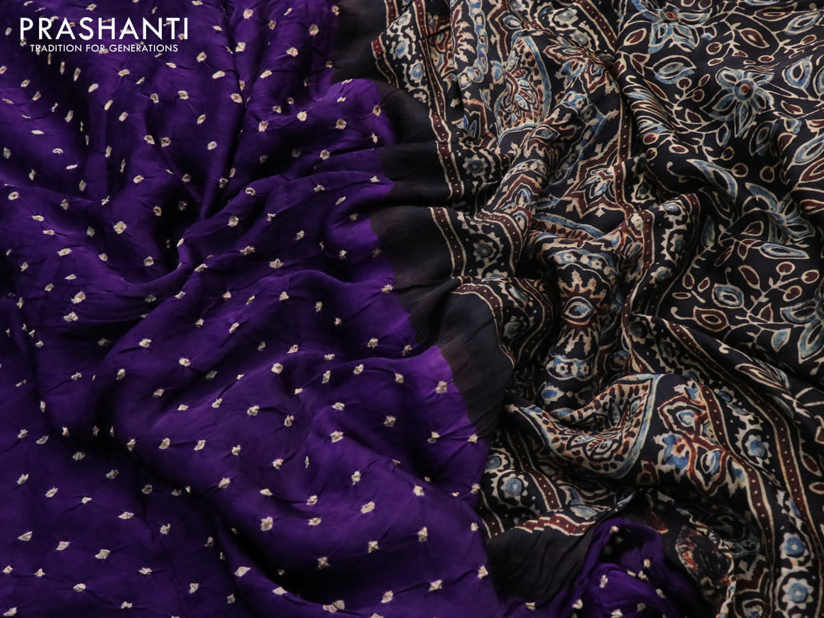 Modal silk saree violet and black with allover bandhani prints and ajrakh printed pallu