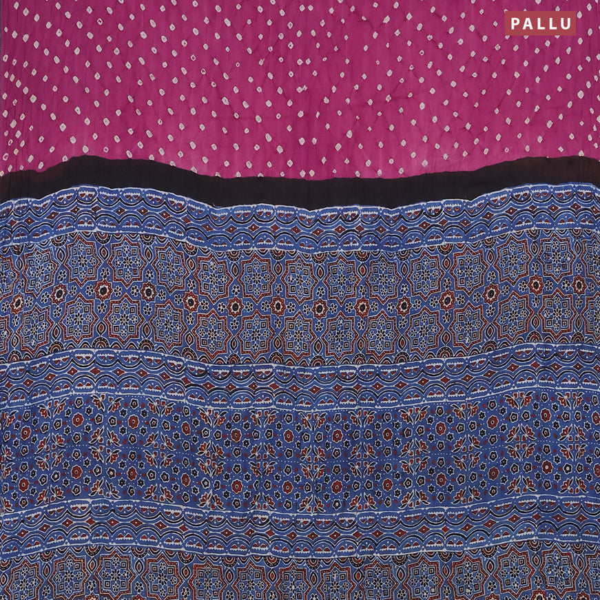 Modal silk saree purple shade and peacock blue with allover bandhani prints and ajrakh printed pallu