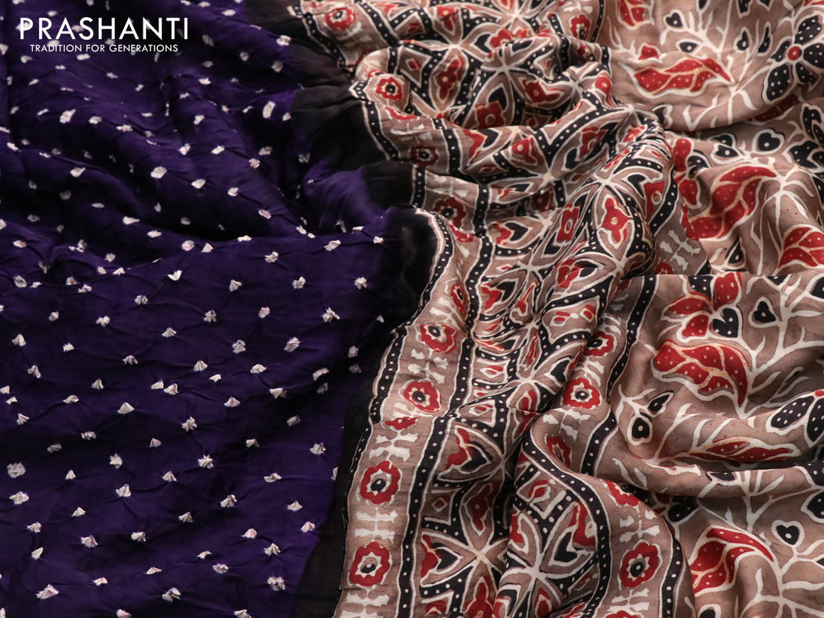 Modal silk saree deep violet and brown with allover bandhani prints and ajrakh printed pallu
