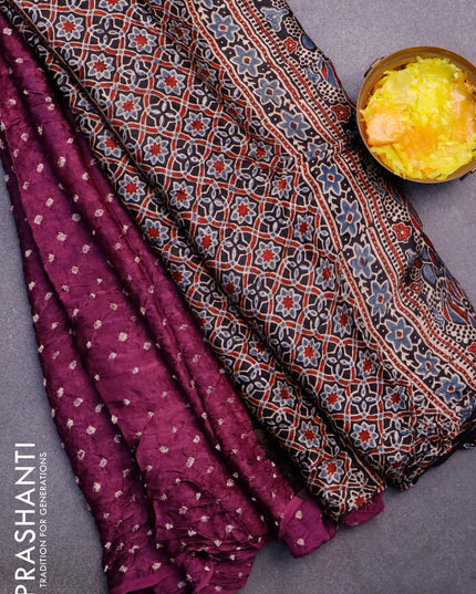 Modal silk saree purple and black with allover bandhani prints and ajrakh printed pallu