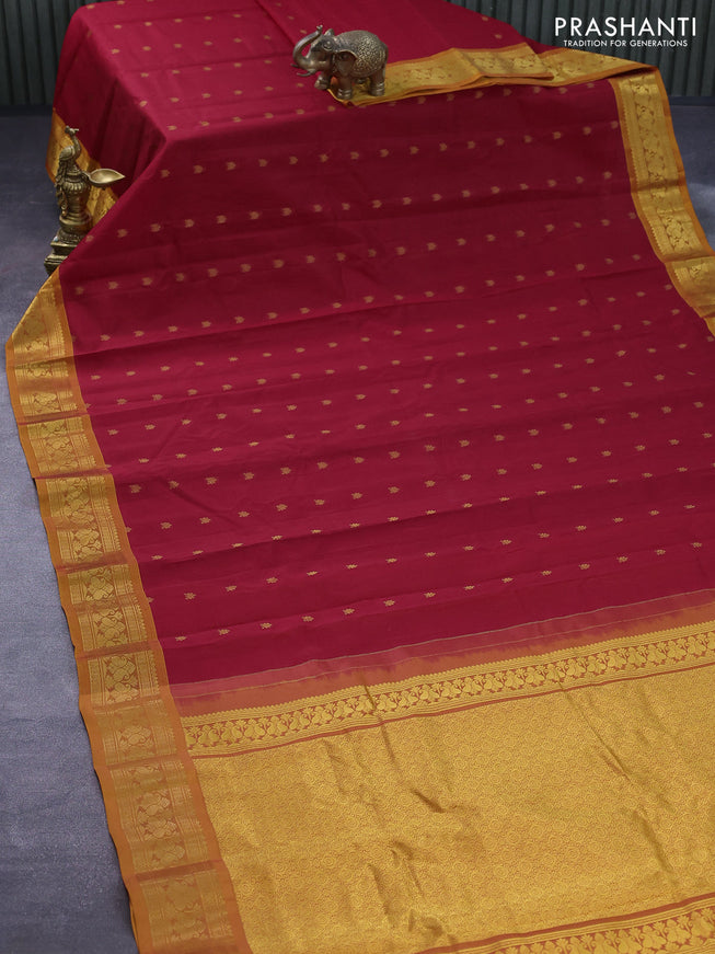 Gadwal silk cotton saree red and mustard yellow with allover zari woven buttas and paisley zari woven border