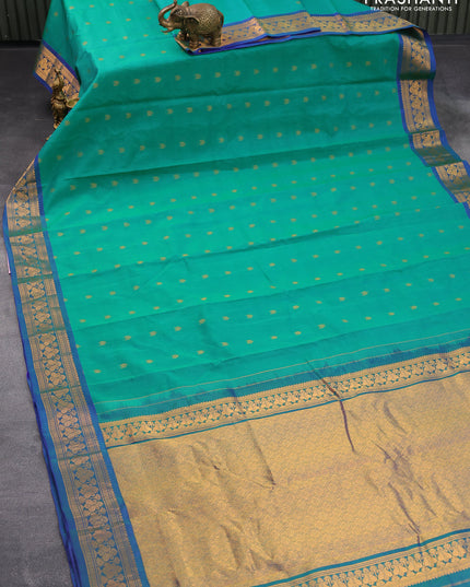 Gadwal silk cotton saree dual shade of teal green and dual shade of blue with allover zari woven buttas and paisley zari woven border