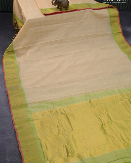 Gadwal silk cotton saree sandal and green with zari woven buttas and zari woven border