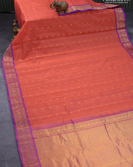 Gadwal silk cotton saree peach orange and dual shade of purple with allover zari woven buttas and paisley zari woven border
