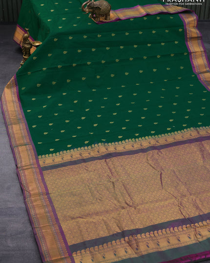 Gadwal silk cotton saree green and purple with allover zari woven buttas and zari woven border