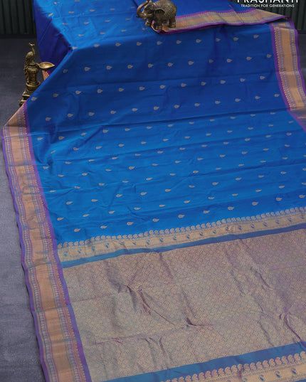 Gadwal silk cotton saree dual shade of blue and dual shade of purple with allover zari woven buttas and zari woven border