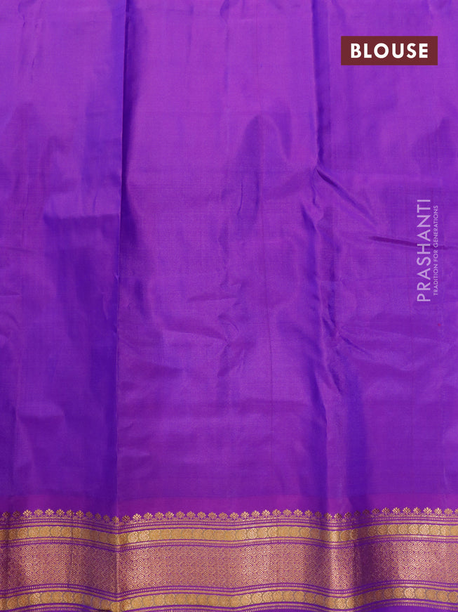 Gadwal silk cotton saree dual shade of bluish green and dual shade of purple with allover zari woven buttas and zari woven border