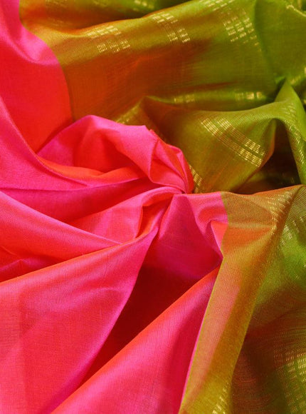 Silk cotton saree dual shade of candy pink and light green with plain body and rettapet zari woven korvai border