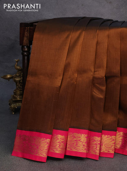 Silk cotton saree honey shade and pink with plain body and zari woven korvai border