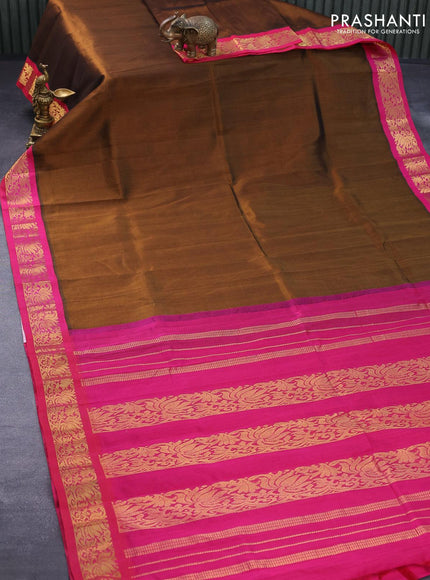 Silk cotton saree honey shade and pink with plain body and zari woven korvai border