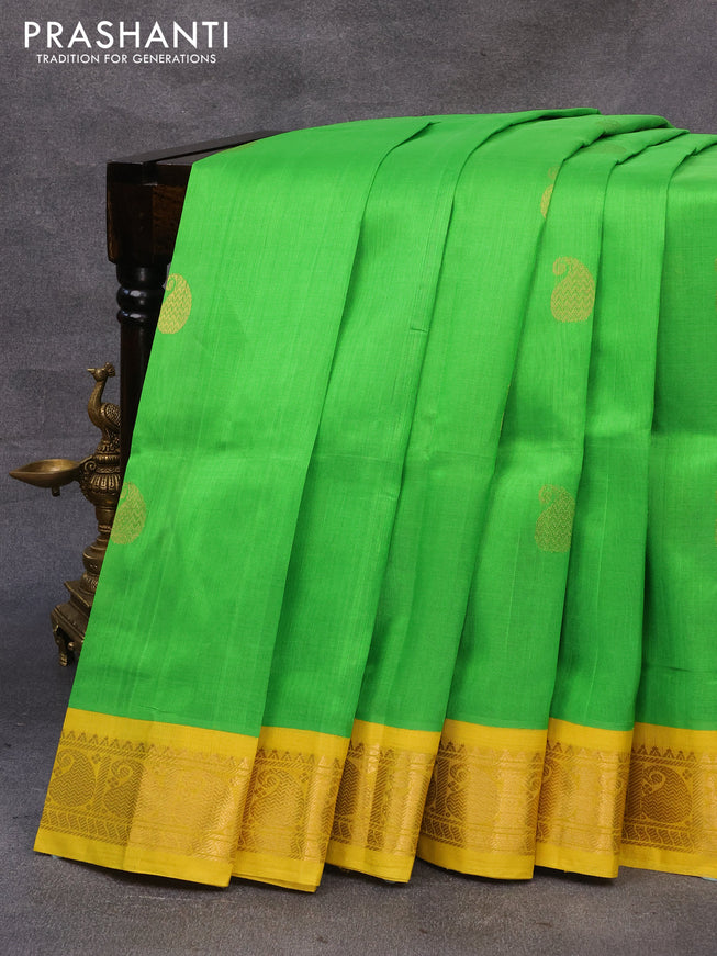 Silk cotton saree light green and lime yellow with paisley zari woven buttas and paisley zari woven border