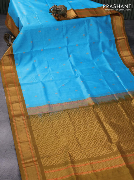 Silk cotton saree light blue and mehendi green with rudhraksha zari woven buttas and zari woven korvai border