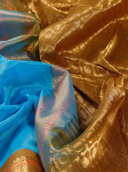 Silk cotton saree light blue and mehendi green with rudhraksha zari woven buttas and zari woven korvai border