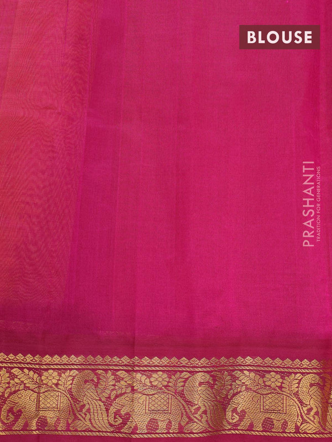 Silk cotton saree orange and magenta pink with plain body and peacock zari woven korvai border