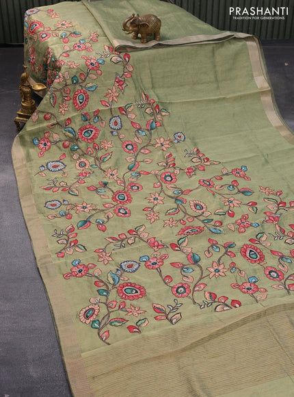 Tissue organza saree pastel green with allover kalamkari applique work and zari woven border