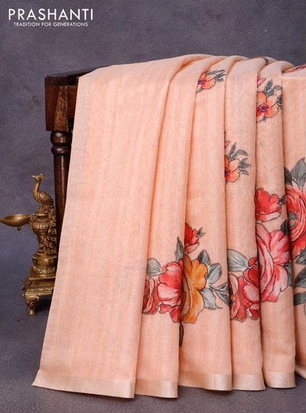 Semi tussar saree peach orange with allover floral design applique work and zari woven border