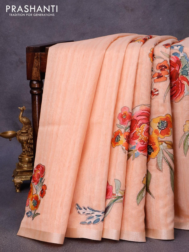 Semi tussar saree peach orange with allover floral design applique work and zari woven border