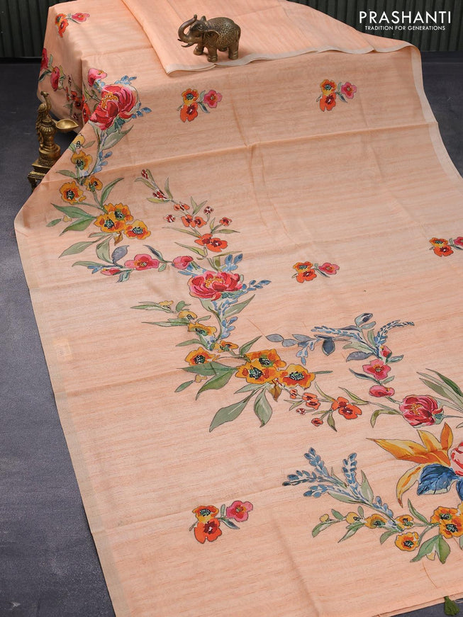 Semi tussar saree peach orange with allover floral design applique work and zari woven border