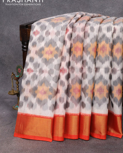 Ikat silk cotton saree off white and orange with allover ikat weaves and zari woven border