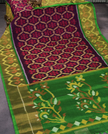 Ikat silk cotton saree deep violet and green with allover ikat weaves and long ikat woven border