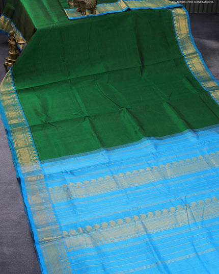 Silk cotton saree green and light blue with allover vairaosi pattern and zari woven border