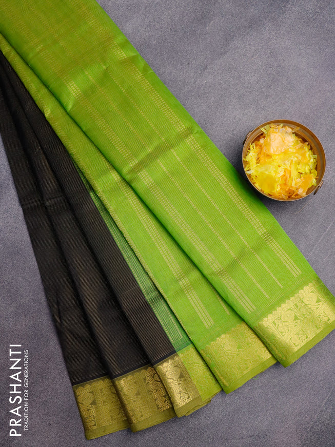 Silk cotton saree black and light green with allover vairaosi pattern and annam zari woven border