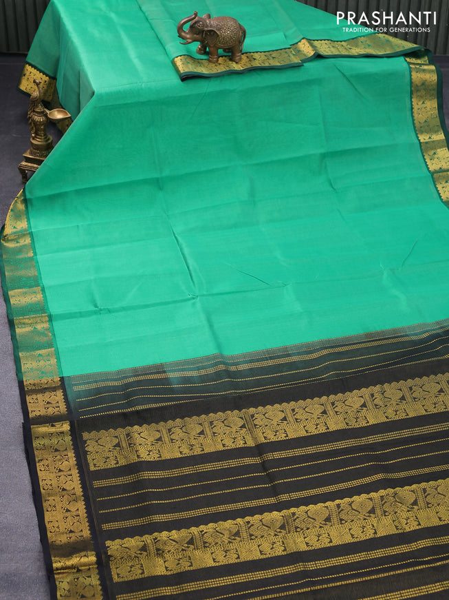 Silk cotton saree teal green and black with allover vairaosi pattern and annam zari woven border