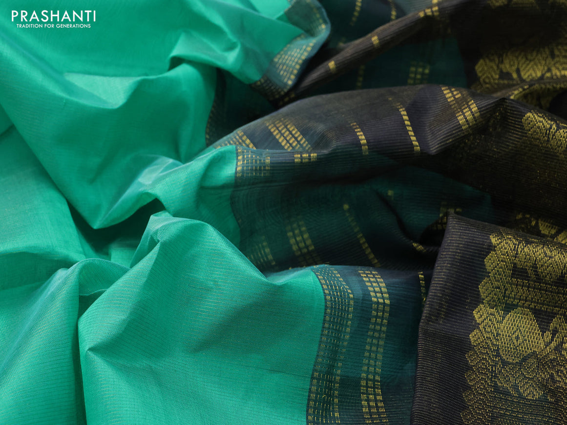 Silk cotton saree teal green and black with allover vairaosi pattern and annam zari woven border